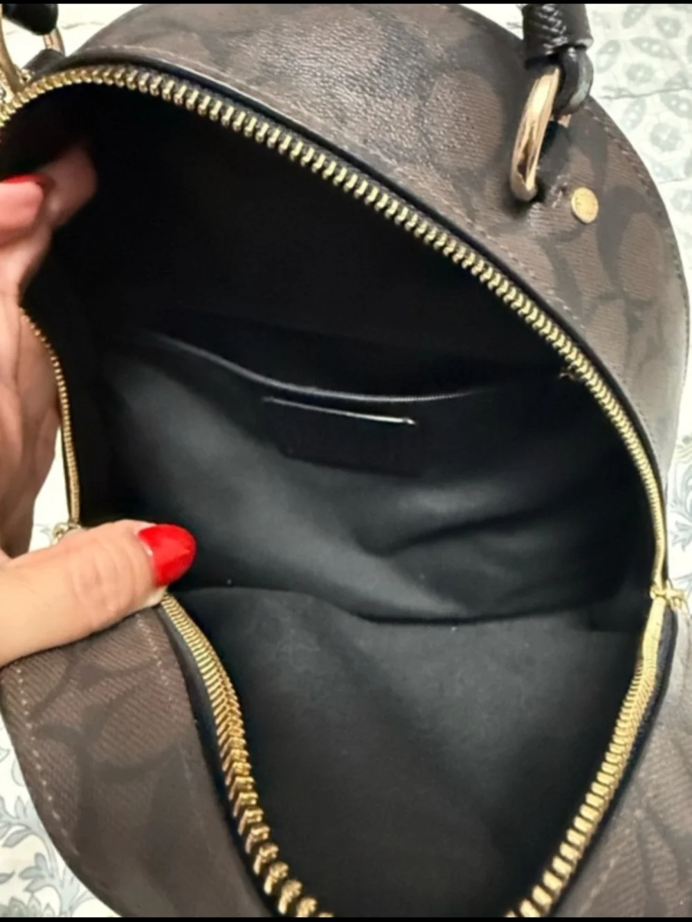 Coach Black Staffiano Leather Mini Backpack with Gold Hardware Accents